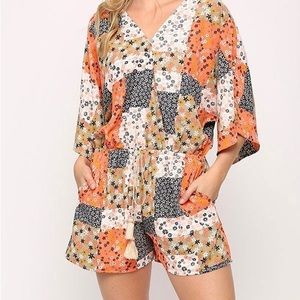 Women's Printed Surplice Romper With Waist Tassel Tie And Bottom Lining